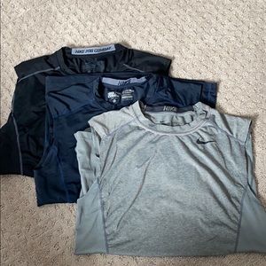 Nike Sleeveless Pro Combat workout shirts